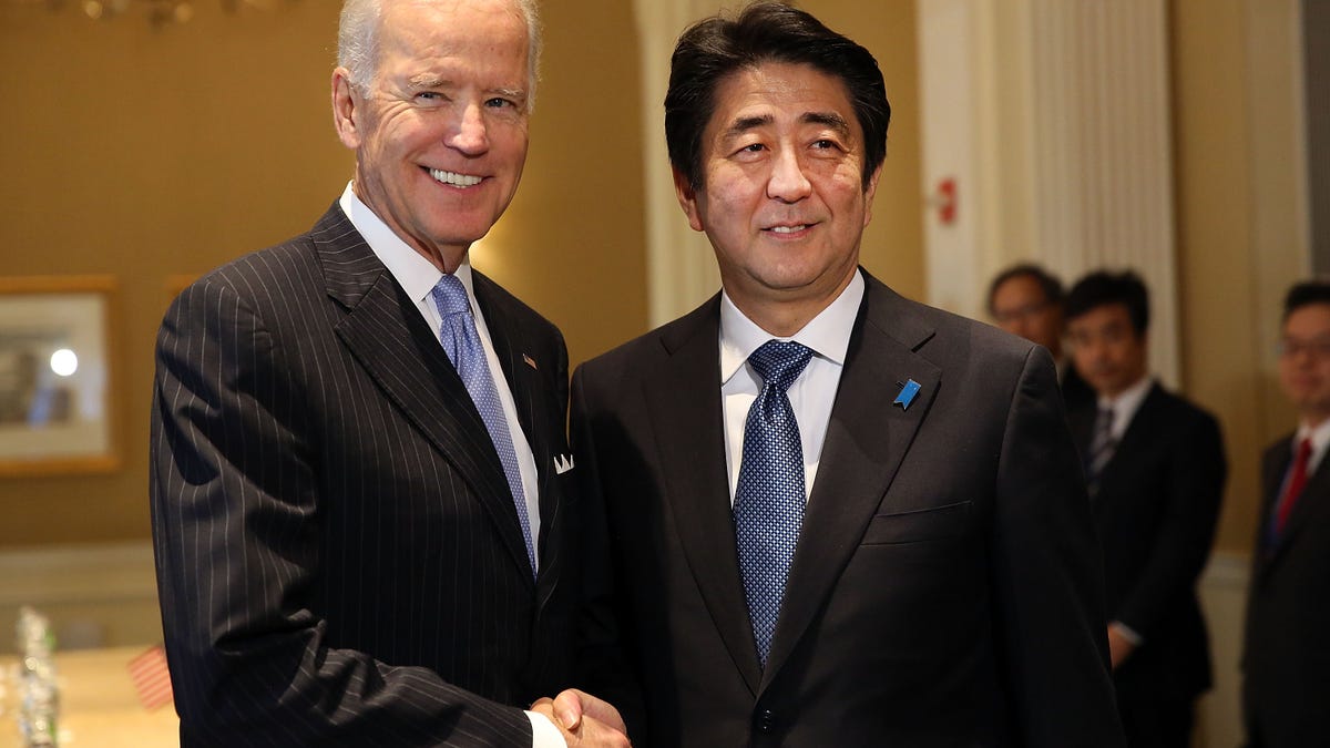 Biden and Abe shake hands