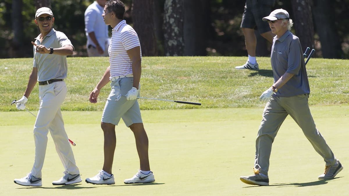 Former President Obama playing golf with Larry David on Martha's Vineyard