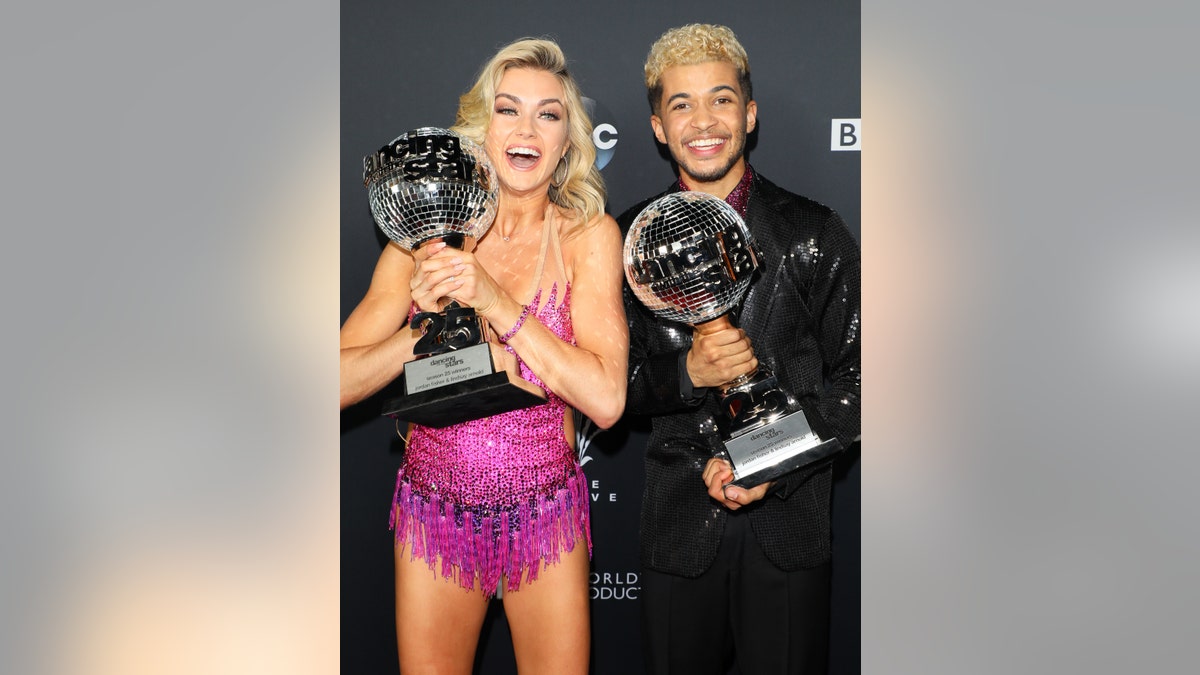 Lindsay Arnold and Jordan Fisher Mirrorball Trophy