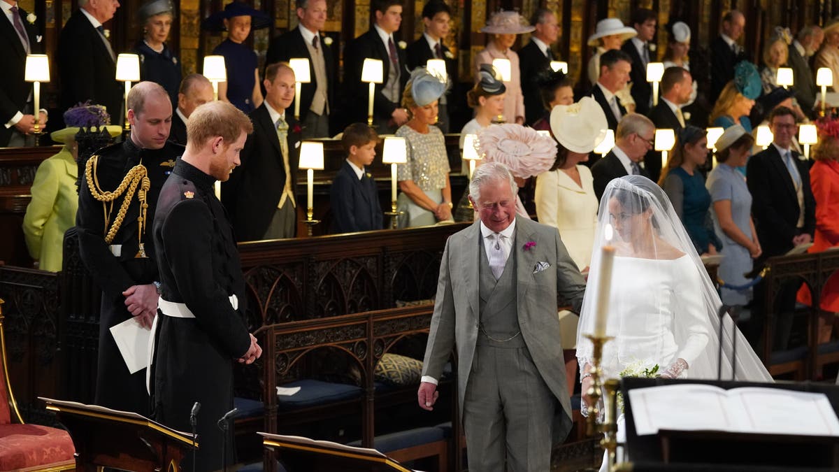 King Charles walks Meghan Markle down the aisle at her wedding