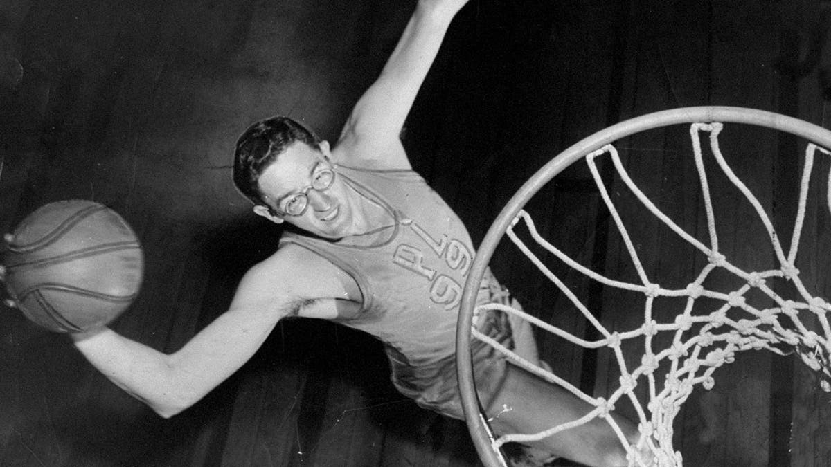 George Mikan of the Lakers during warmups