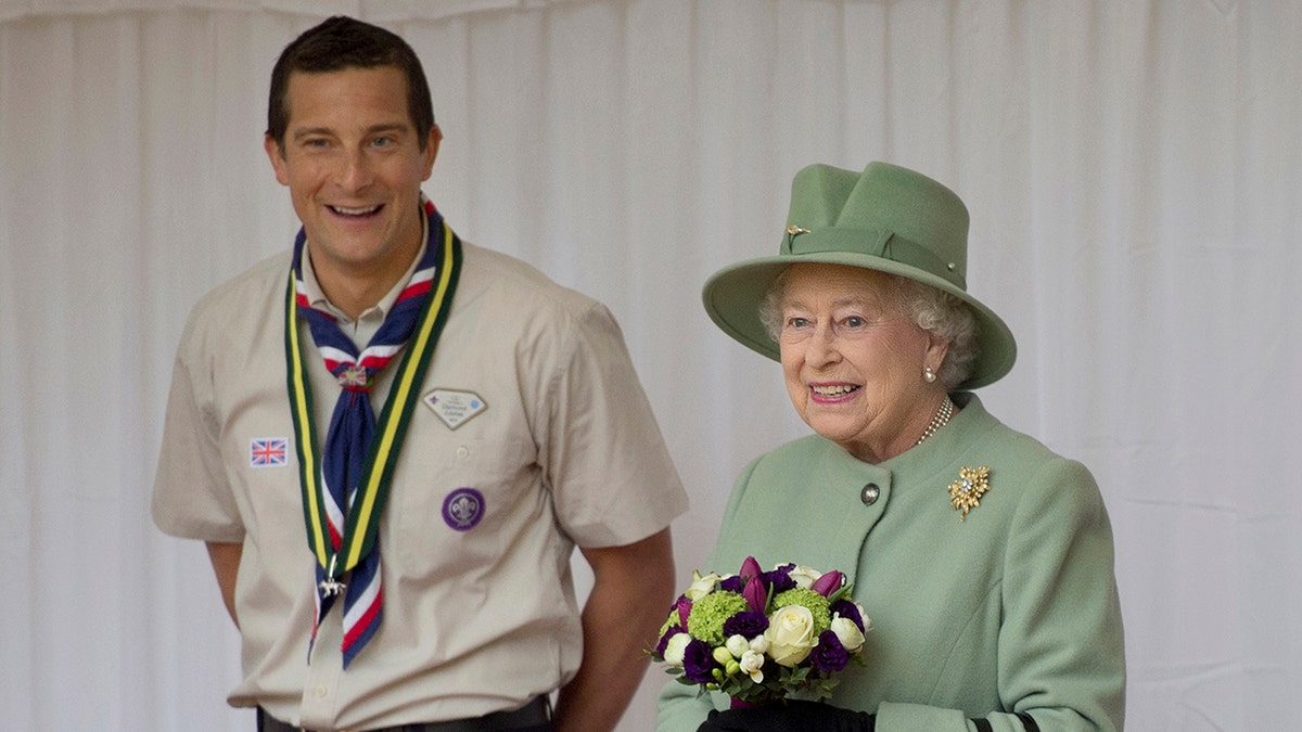Queen Elizabeth II and Chief Scout, Bear Grylls