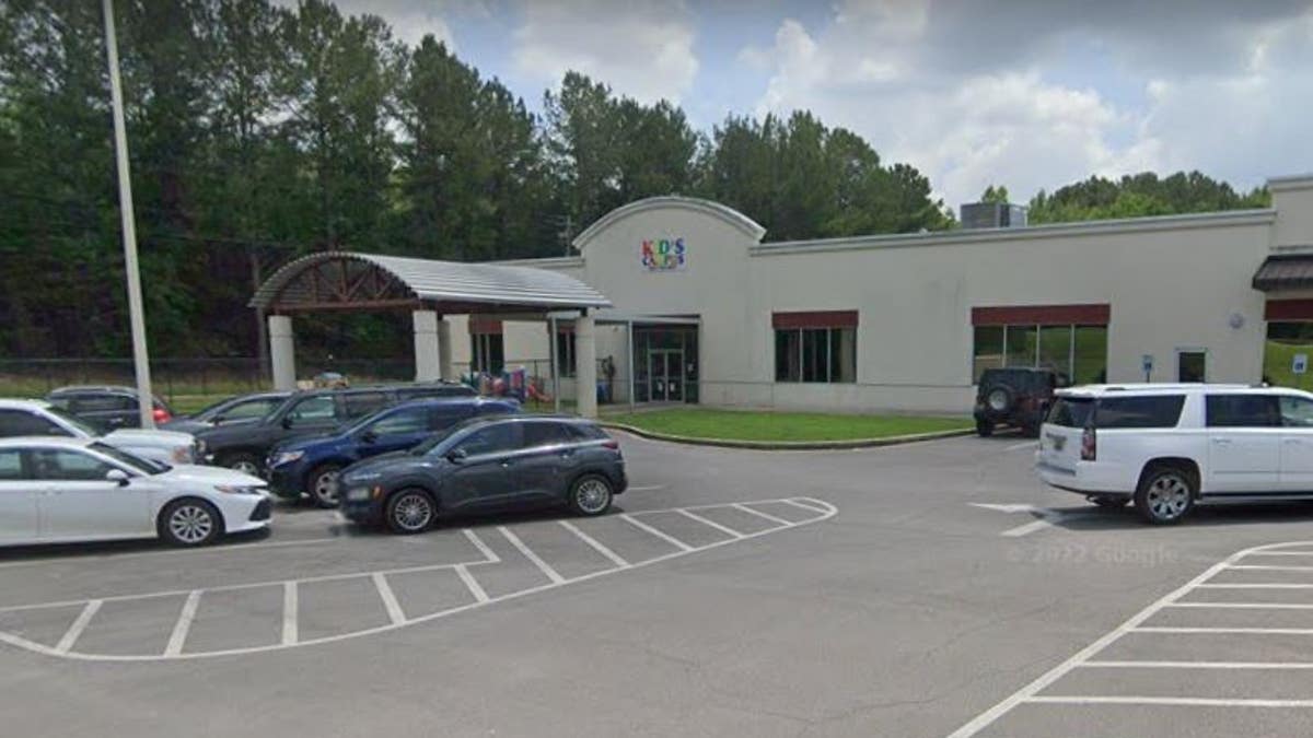 Cars in the parking lot of a day care