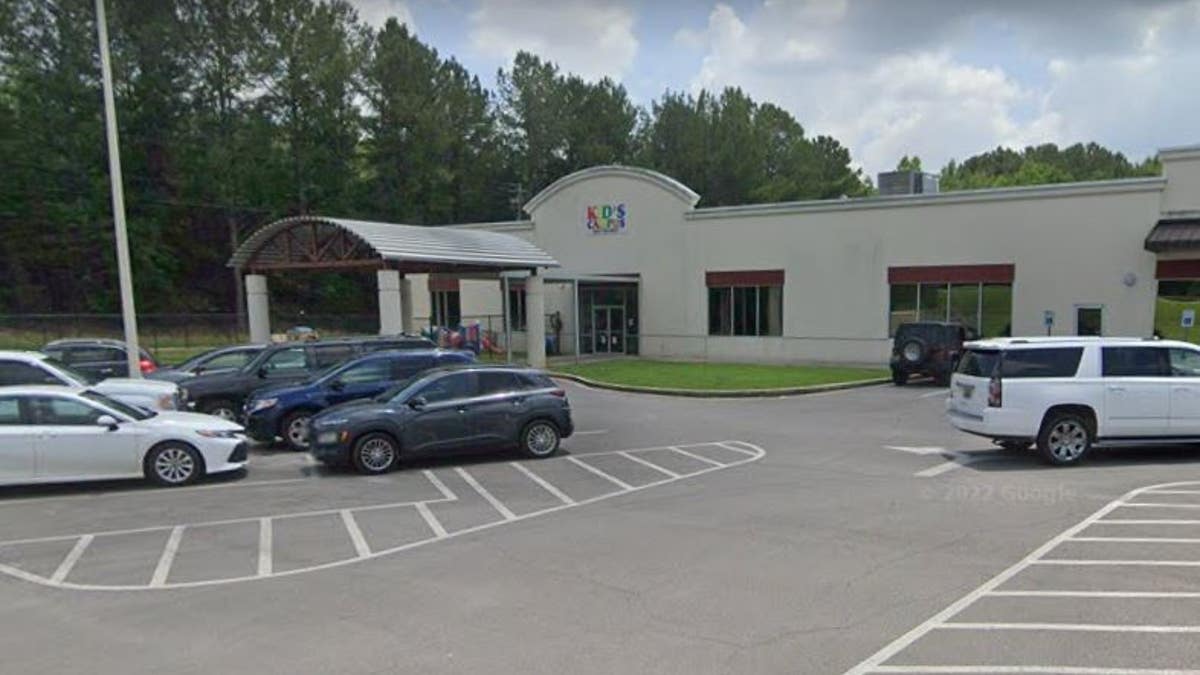 Cars in the parking lot of a day care