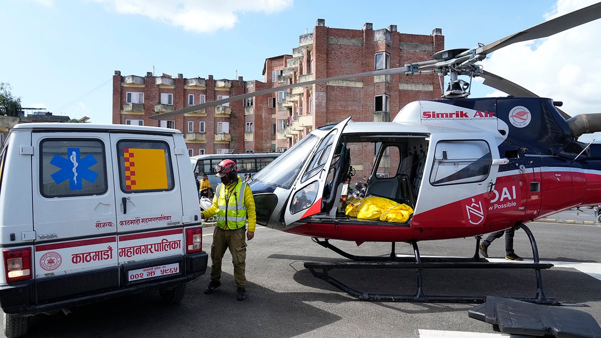 Helicopter carries Hilaree Nelson