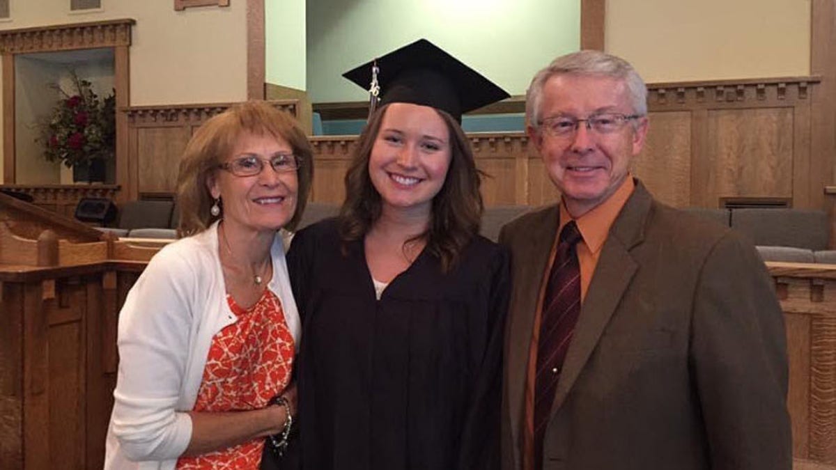 homeschool graduate with parents