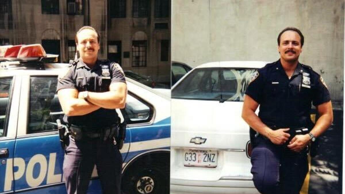 Fallen NYPD officer James Leahy standing in front of vehicles