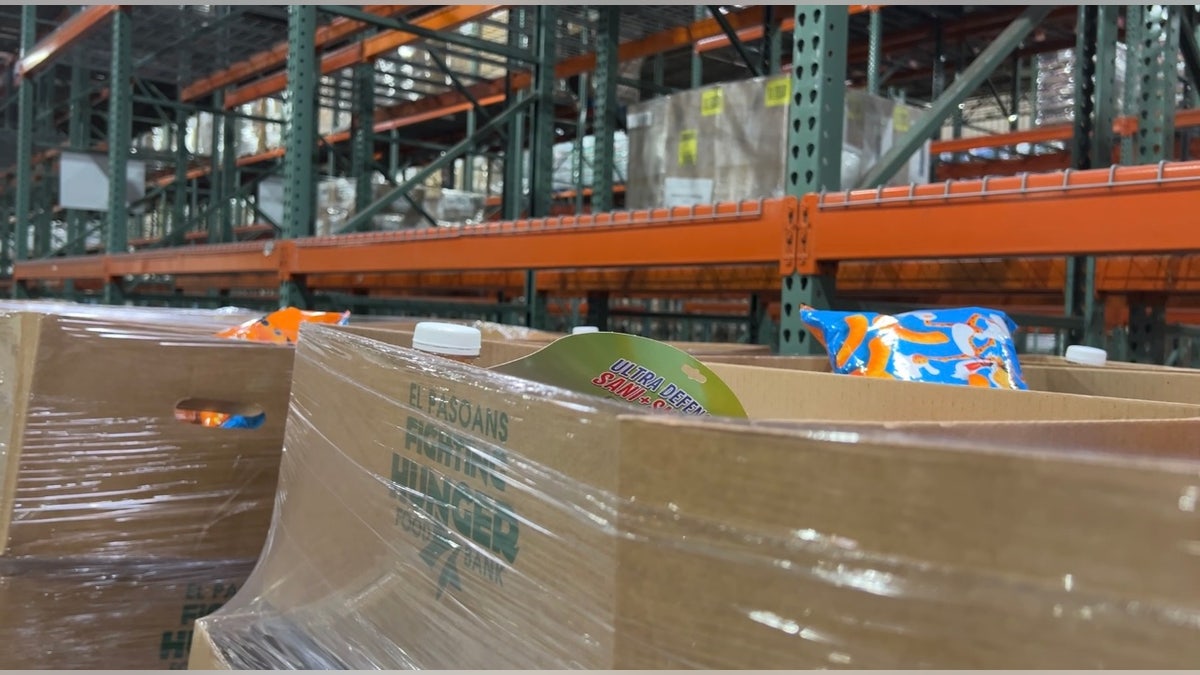 A photo showing an empty shelf at an El Paso food bank