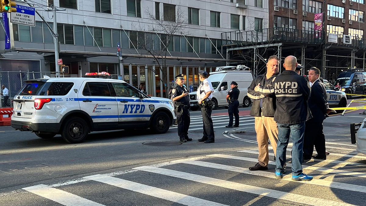 NYC officers near shooting scene 