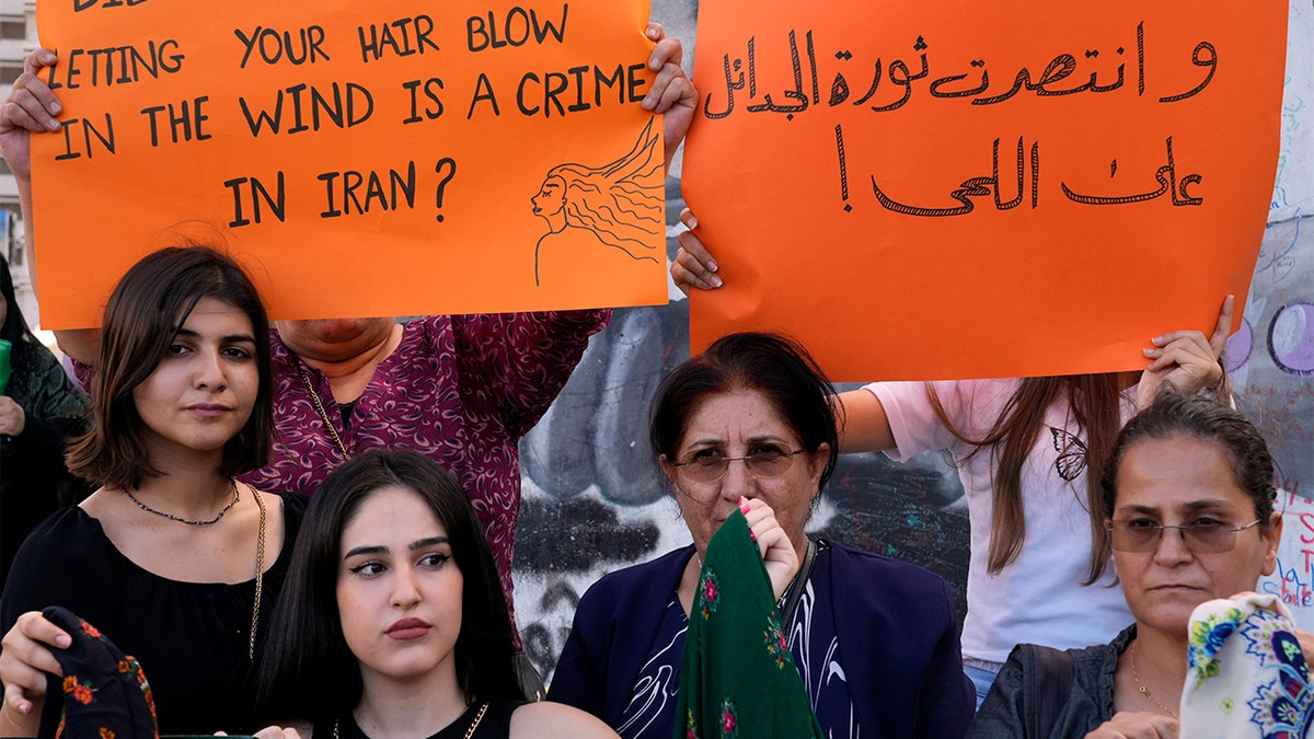 Female activists demonstrate after death of woman in Iran