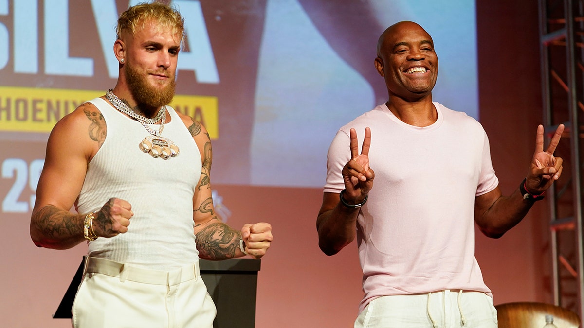 Jake Paul and Anderson Silva pose