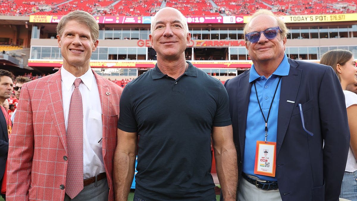 Clark Hunt, Jeff Bezos, and Dean Spanos