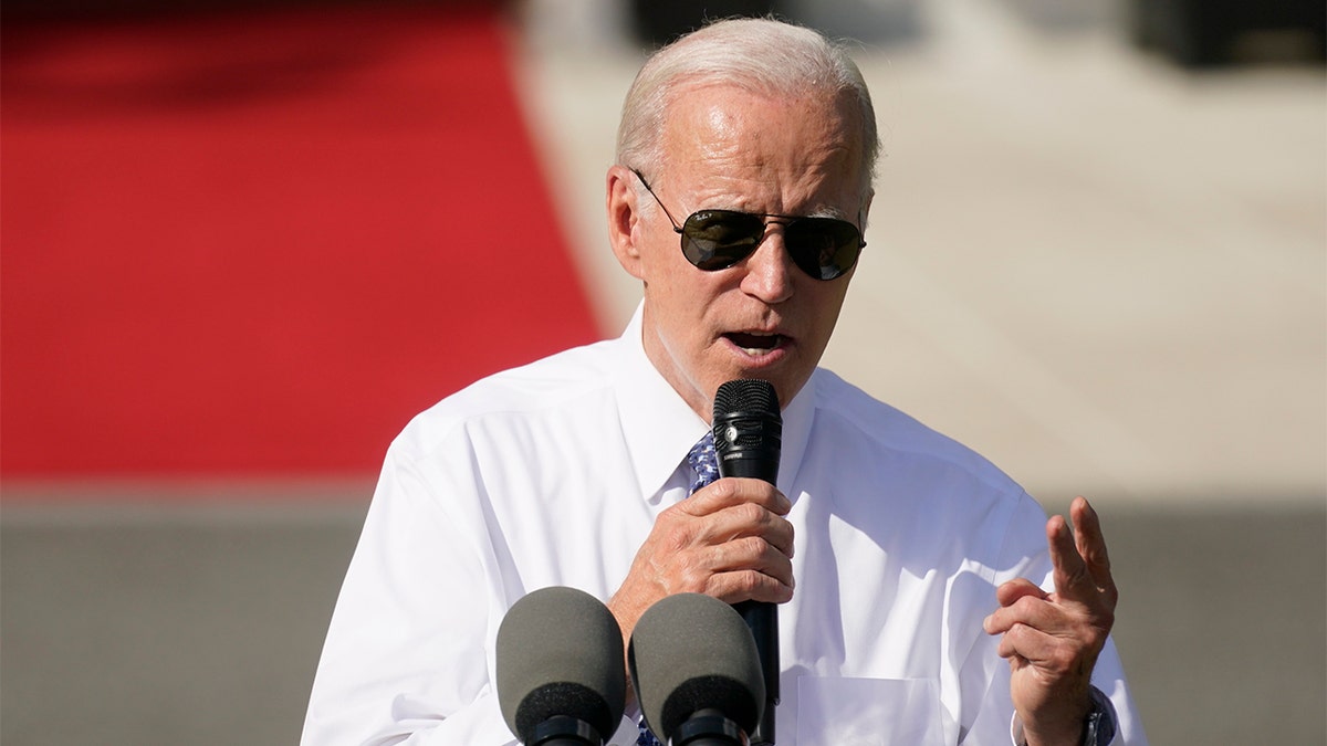 President Biden celebrates the Inflation Reduction Act as the stock market plunges