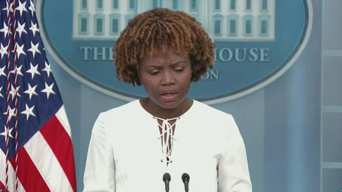 White House Press Secretary Karine Jean-Pierre wearing white 