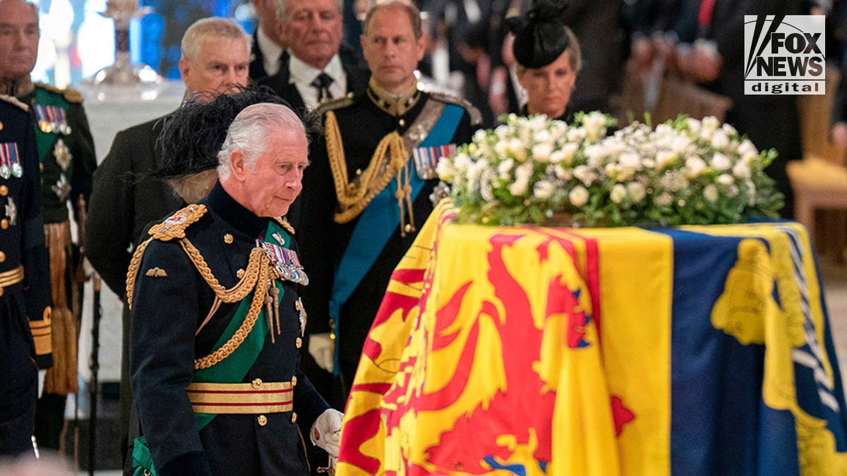 King Charles III overlooks the coffin of Queen Elizabeth II