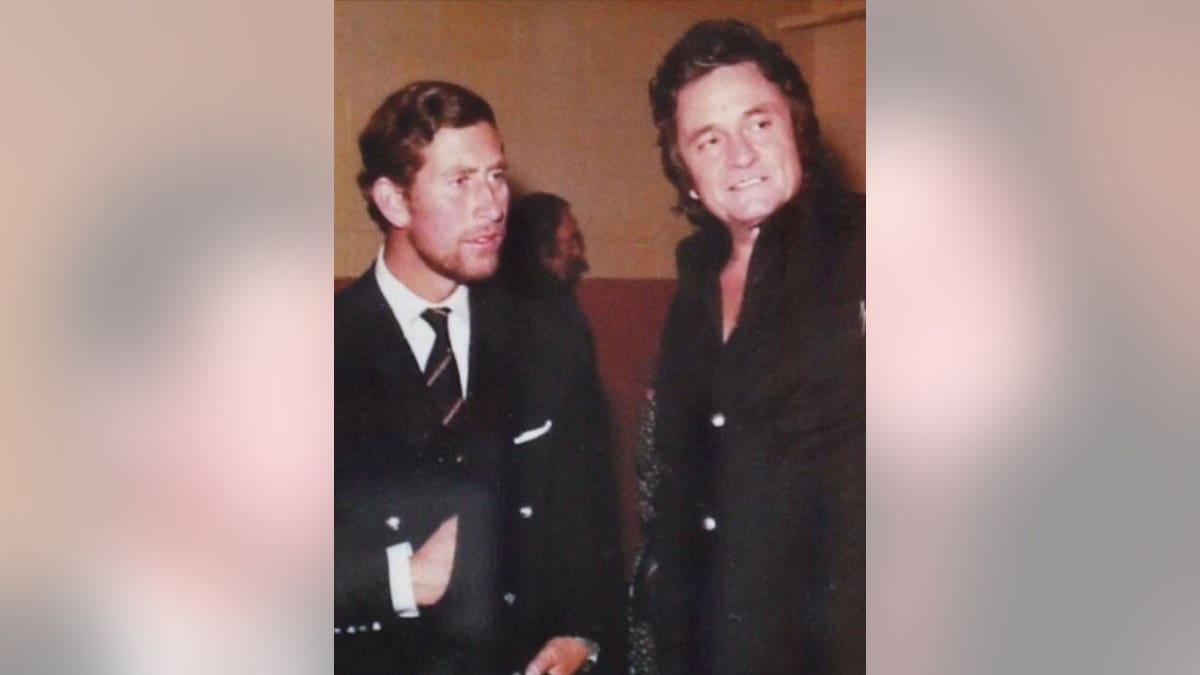 Then Prince Charles and Johnny Cash take a photo together