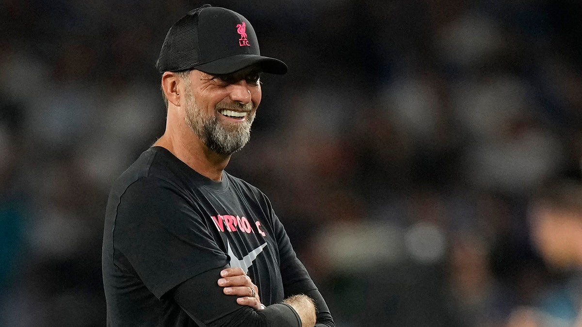 Jurgen Klopp smiles before gametime against Napoli.