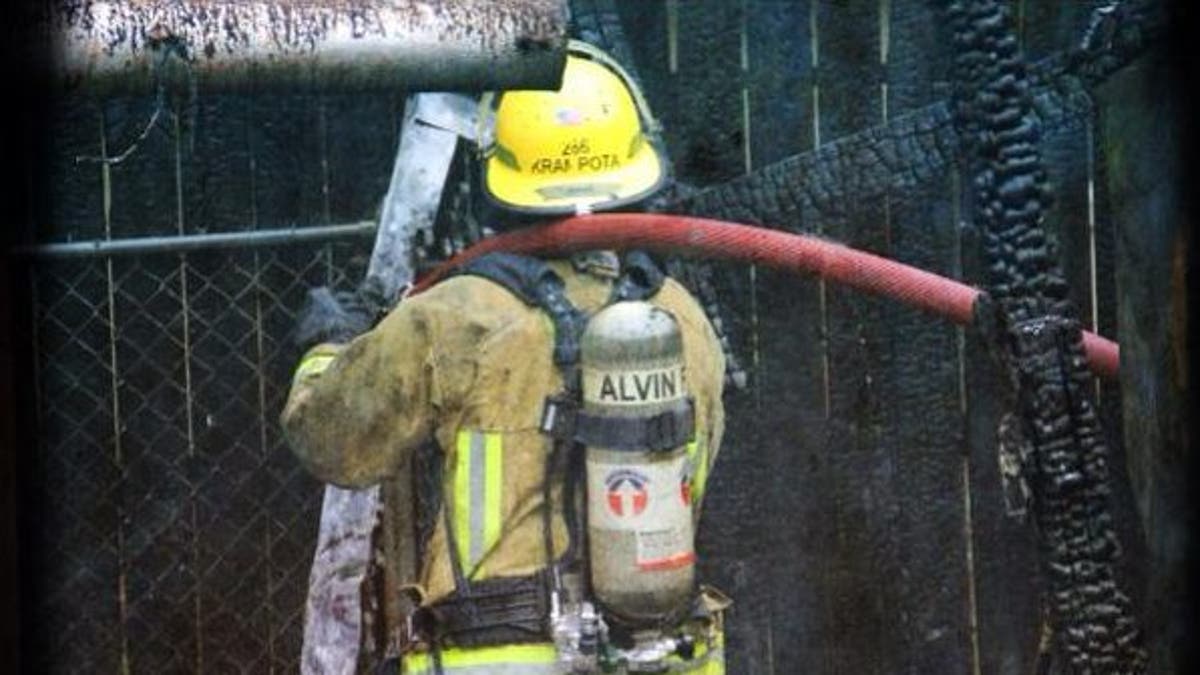 Firefighter participating in training exercise