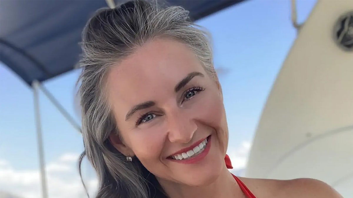 Lindsay Marsh smiling on a boat