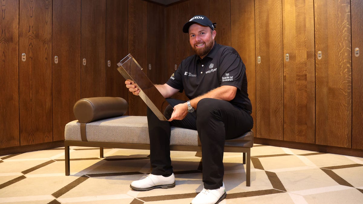 Shane Lowry poses with trophy