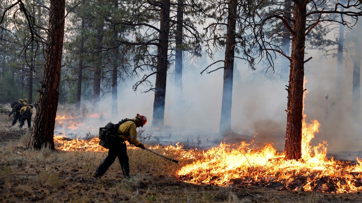 A firefighter at the Mill Fire