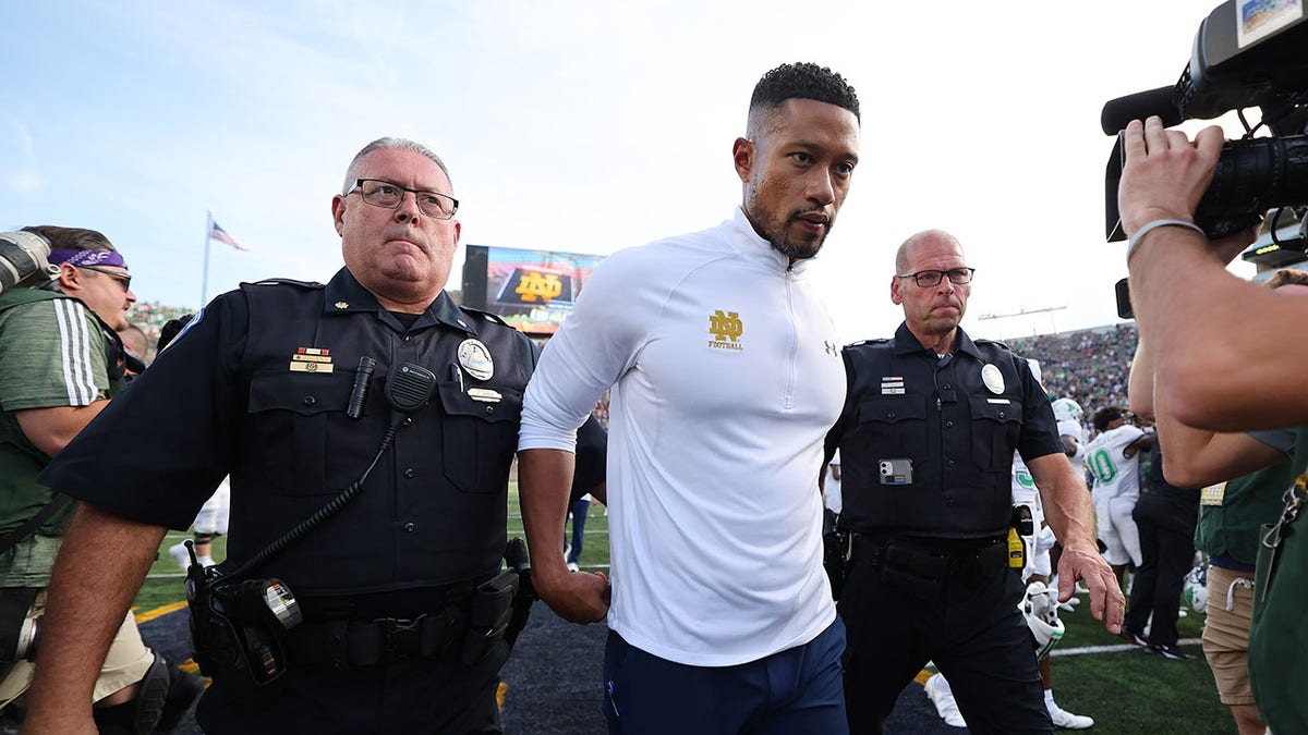 Marcus Freeman walking off field