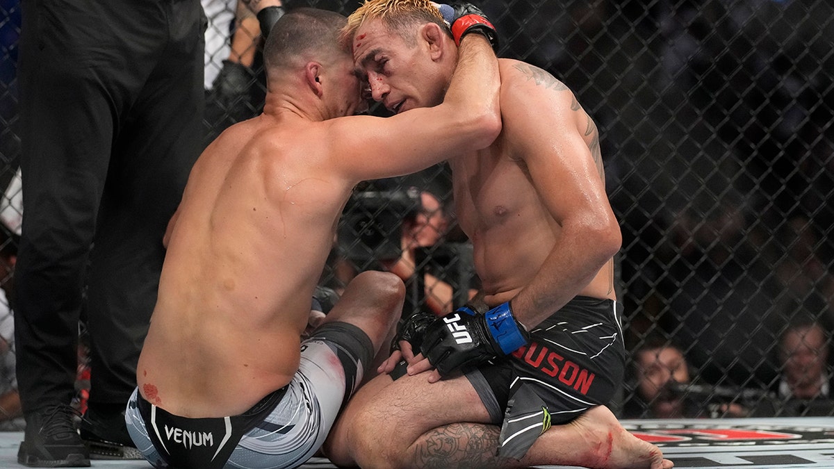 Nate Diaz and Tony Ferguson embrace