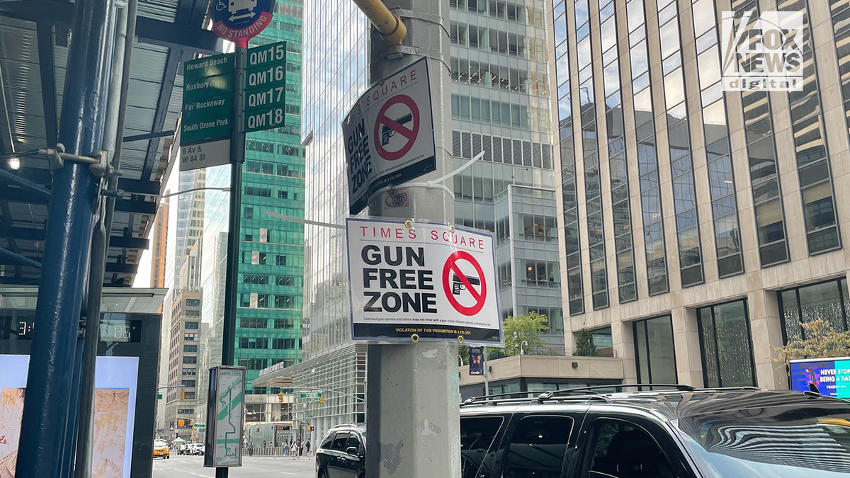 Signs read "Gun Free Zone" in New York City's Manhattan borough.