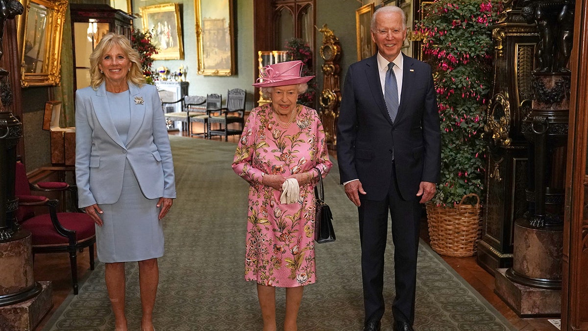 Queen Elizabeth II alongside President Joe Biden and First Lady Jill Biden.