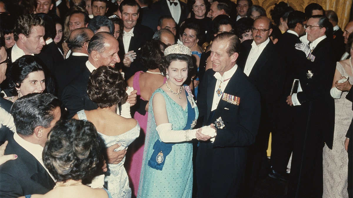 Queen Elizabeth II and Prince Philip dancing