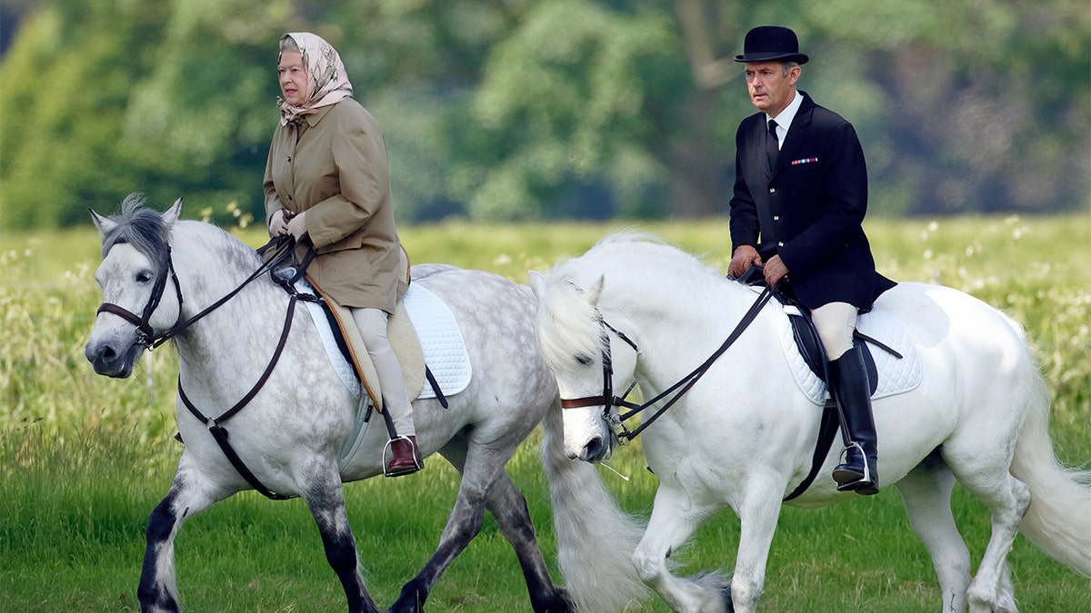 Queen Elizabeth riding a horse