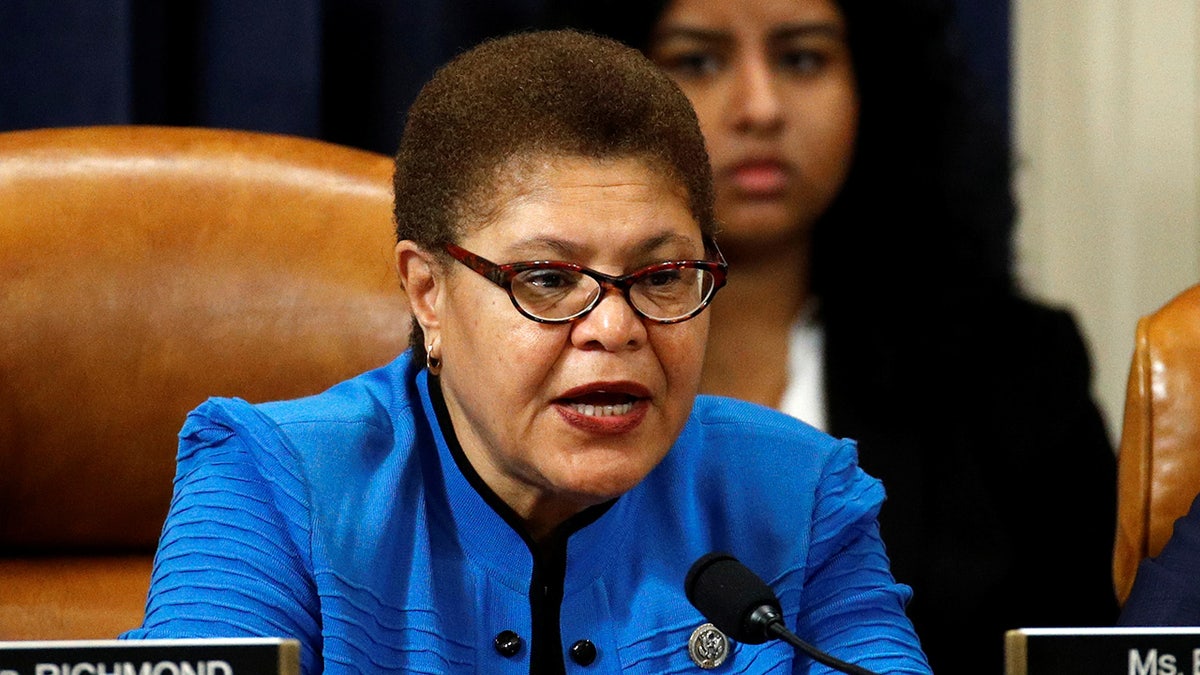 Rep. Karen Bass of California speaking while wearing a blue outfit