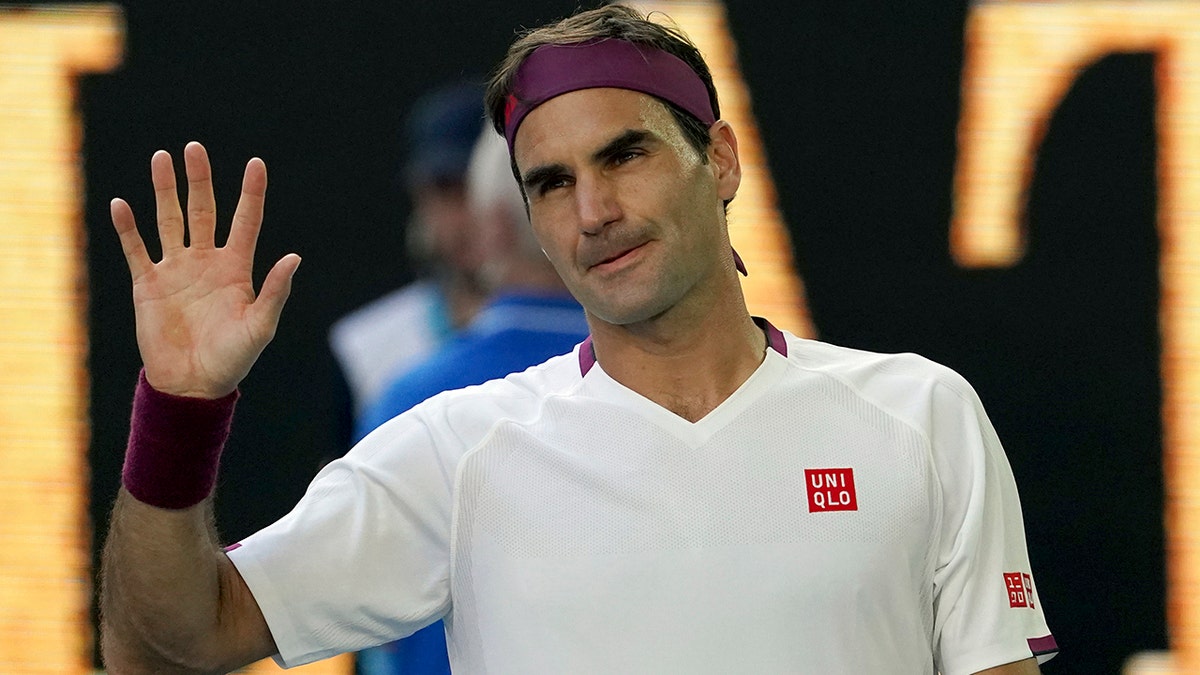 Roger Federer waves