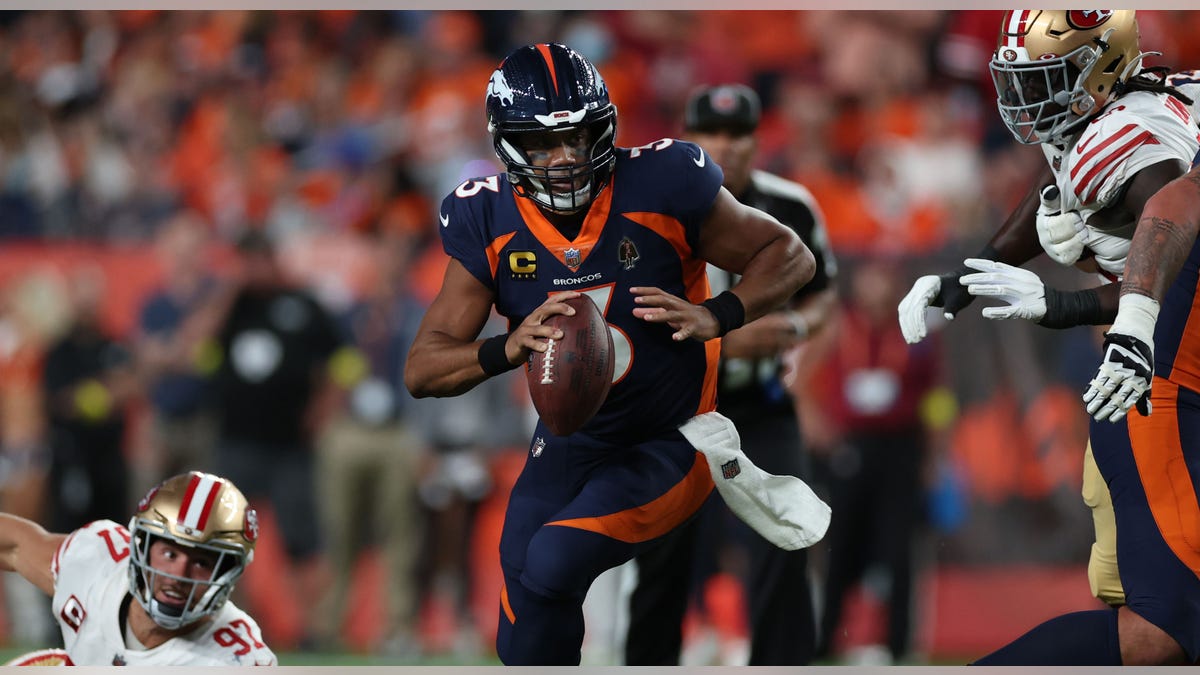 Russell Wilson, #3 of the Denver Broncos, rushes during the first half against the San Francisco 49ers at Empower Field at Mile High on September 25, 2022, in Denver, Colorado.