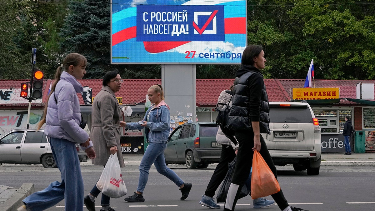 Sign for Russia referendum is seen in Luhansk, Ukraine