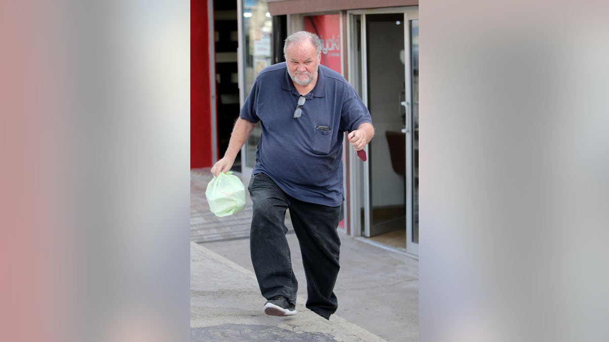 Thomas Markle with takeout