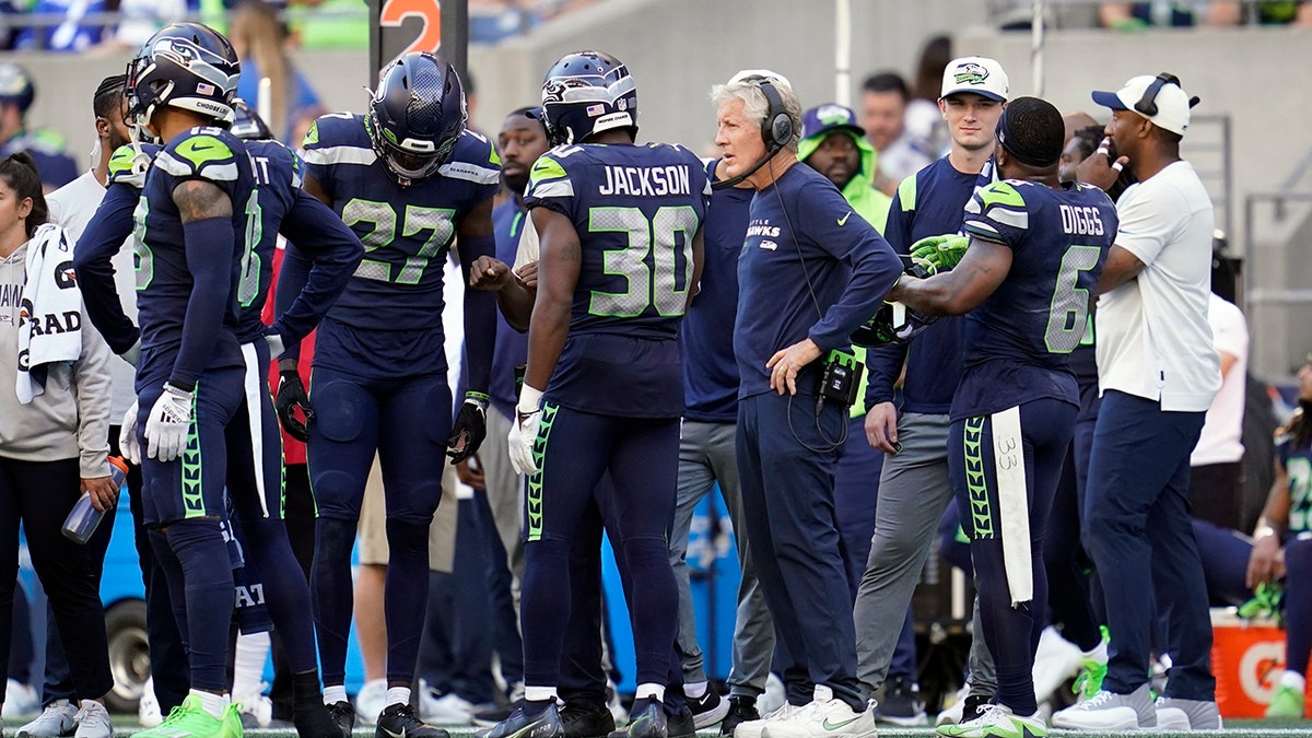 Seahawks players on the sideline