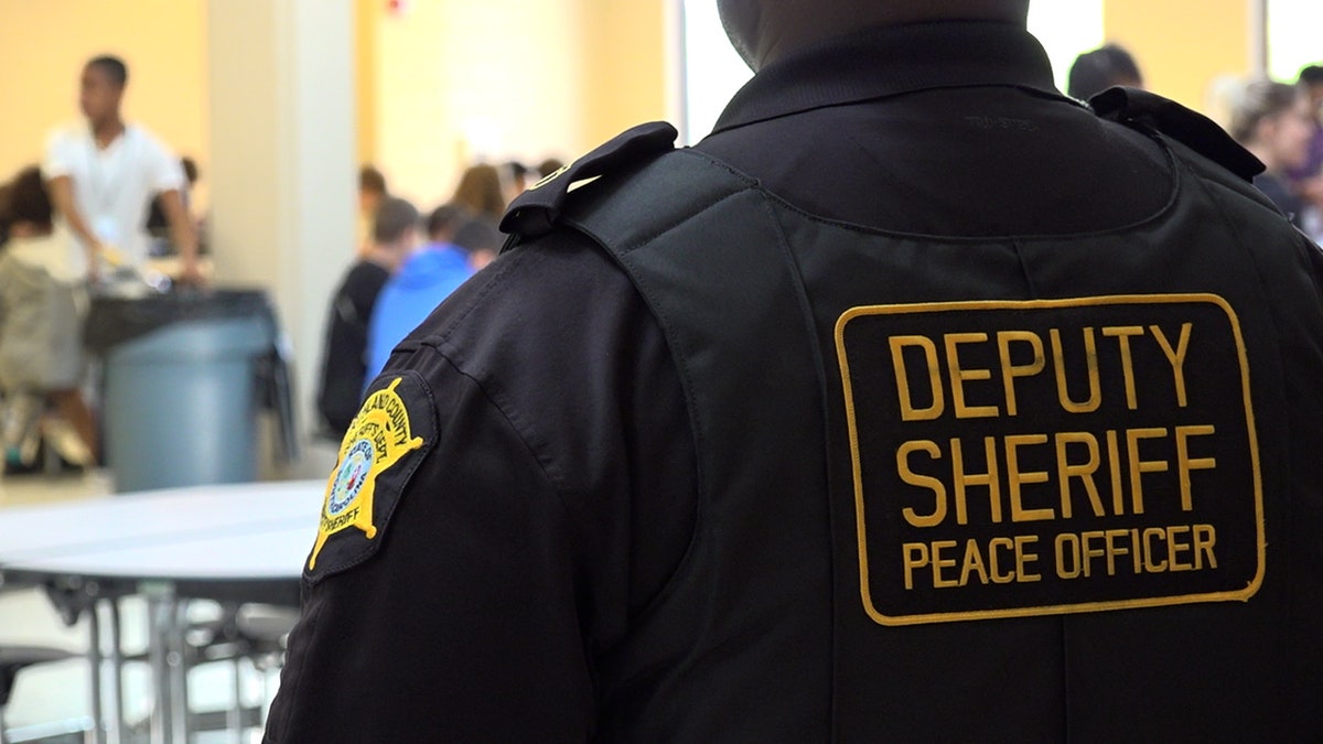 Officer watches over students at lunch