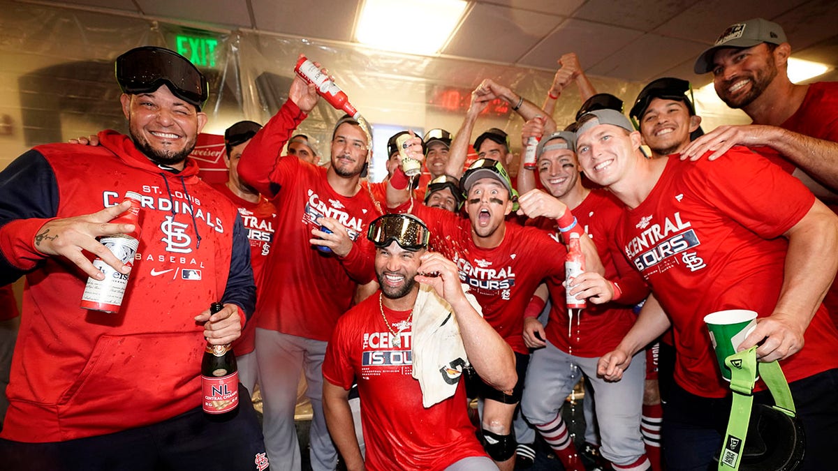 St. Louis Cardinals teammates celebrate in the locker room