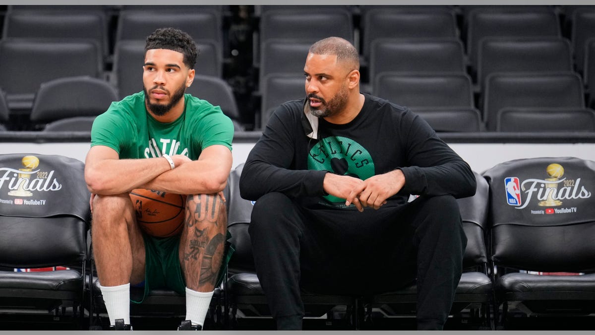 Jayson Tatum and Ime Udoka sitting