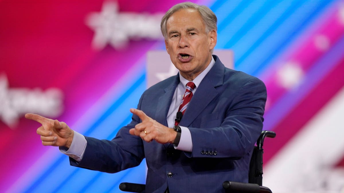 Gov. Abbot on stage speacking at CPAC.