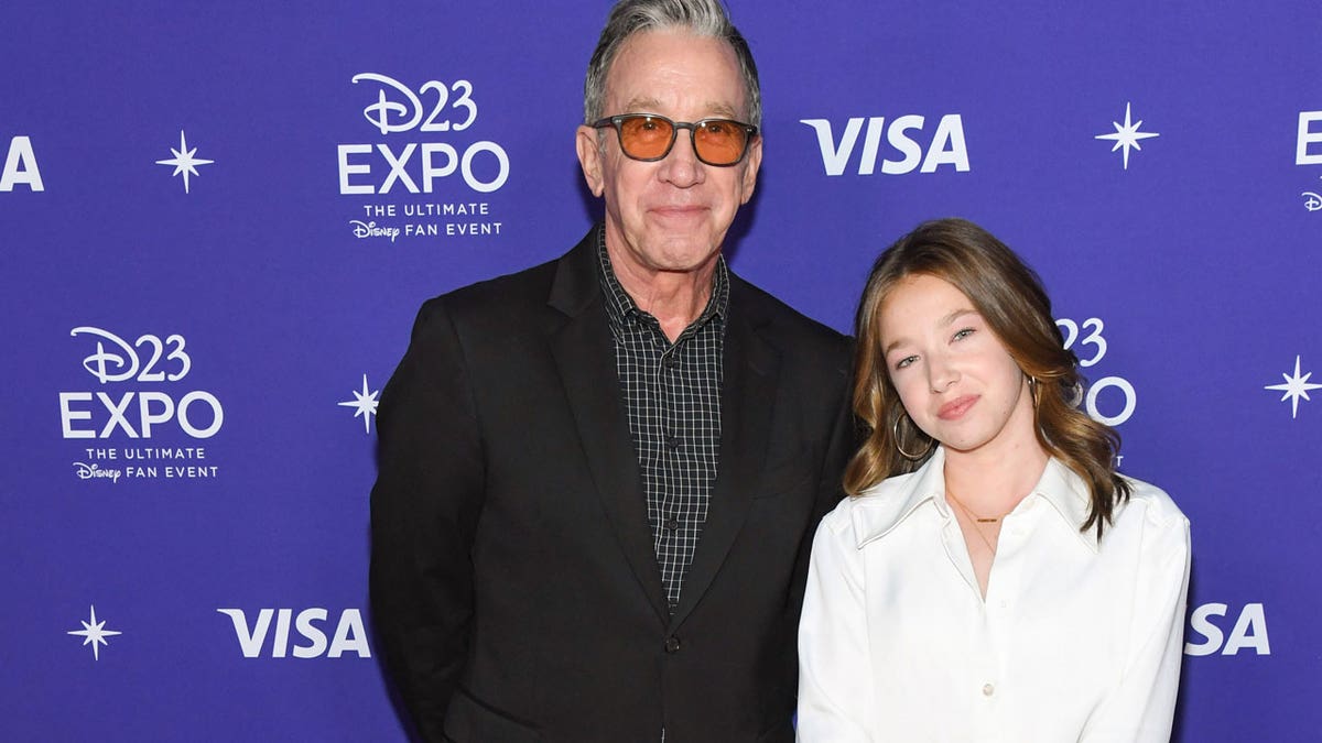 Tim Allen and his daughter pose together