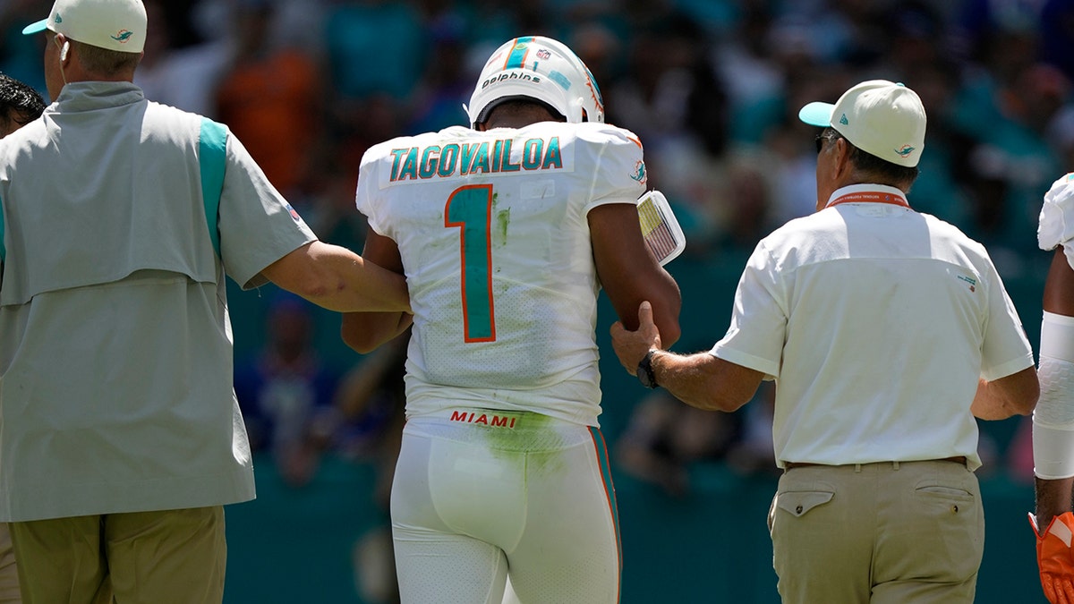Dolphins QB Tua Tagovailoa carried off field after brutal hit. Should he  have been playing?