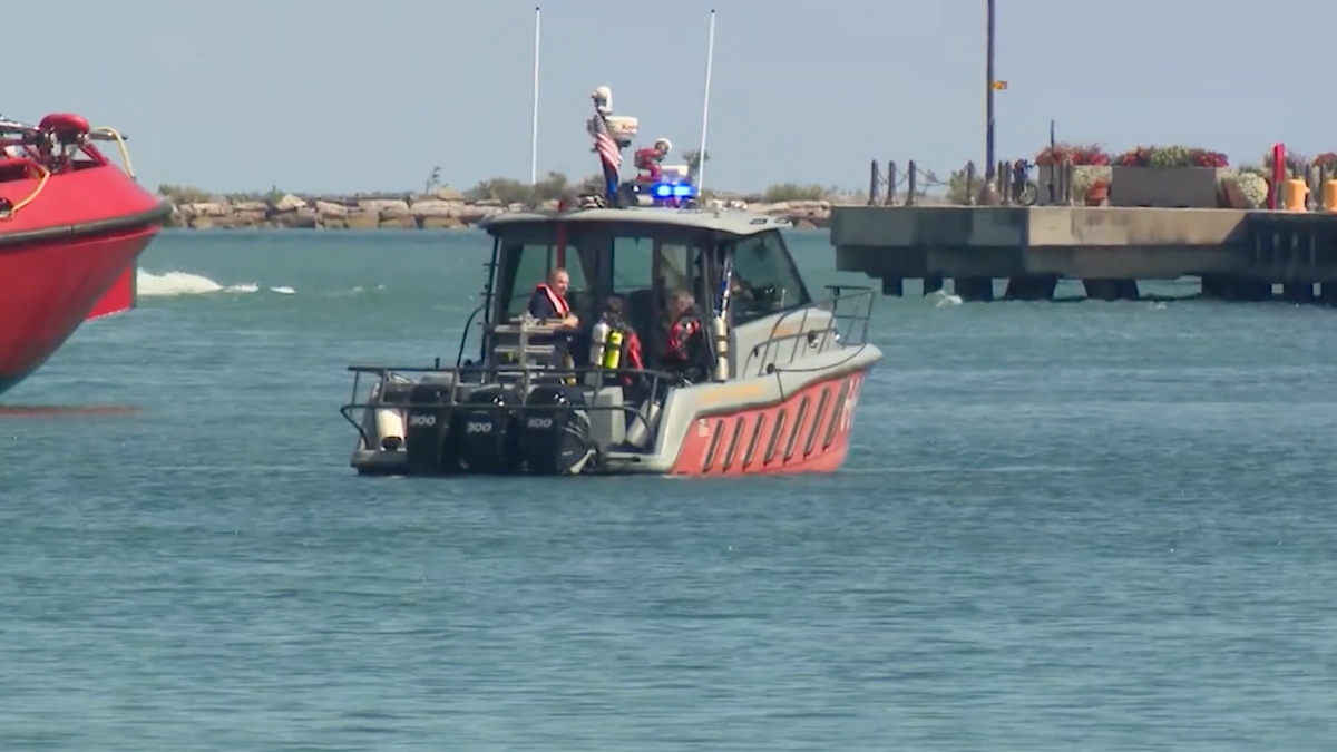 Rescuers in Lake Michigan off Chicago's Navy Pier