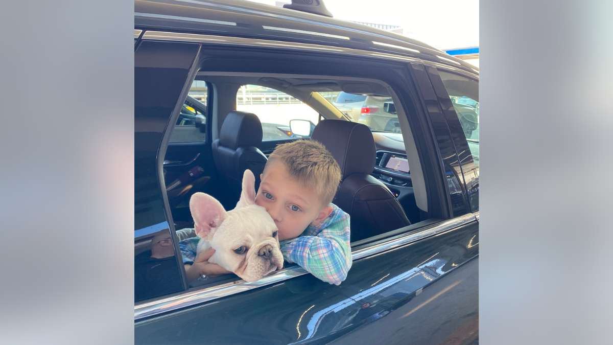 Cooper Roberts with his dog