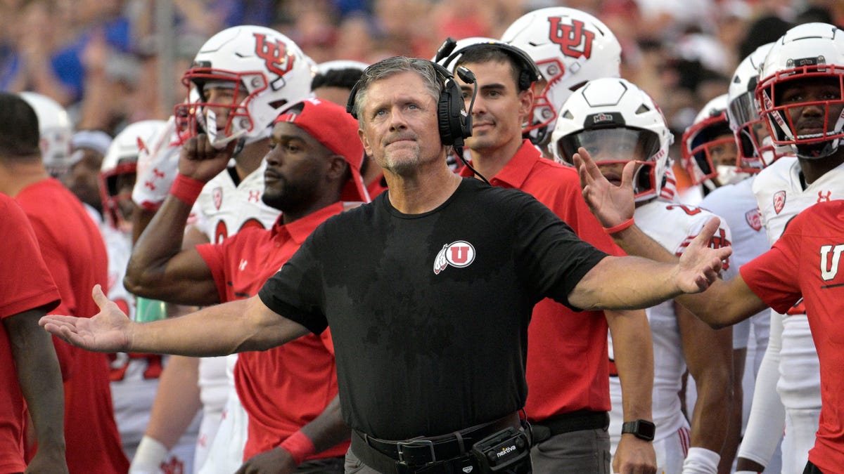 Kyle Whittingham arms out