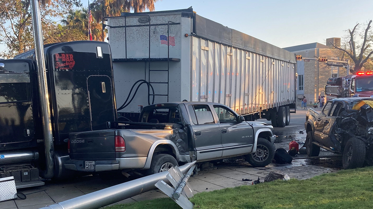 The semi truck that was crashed into by a driver smuggling 9 illegal migrants in Uvalde Texas