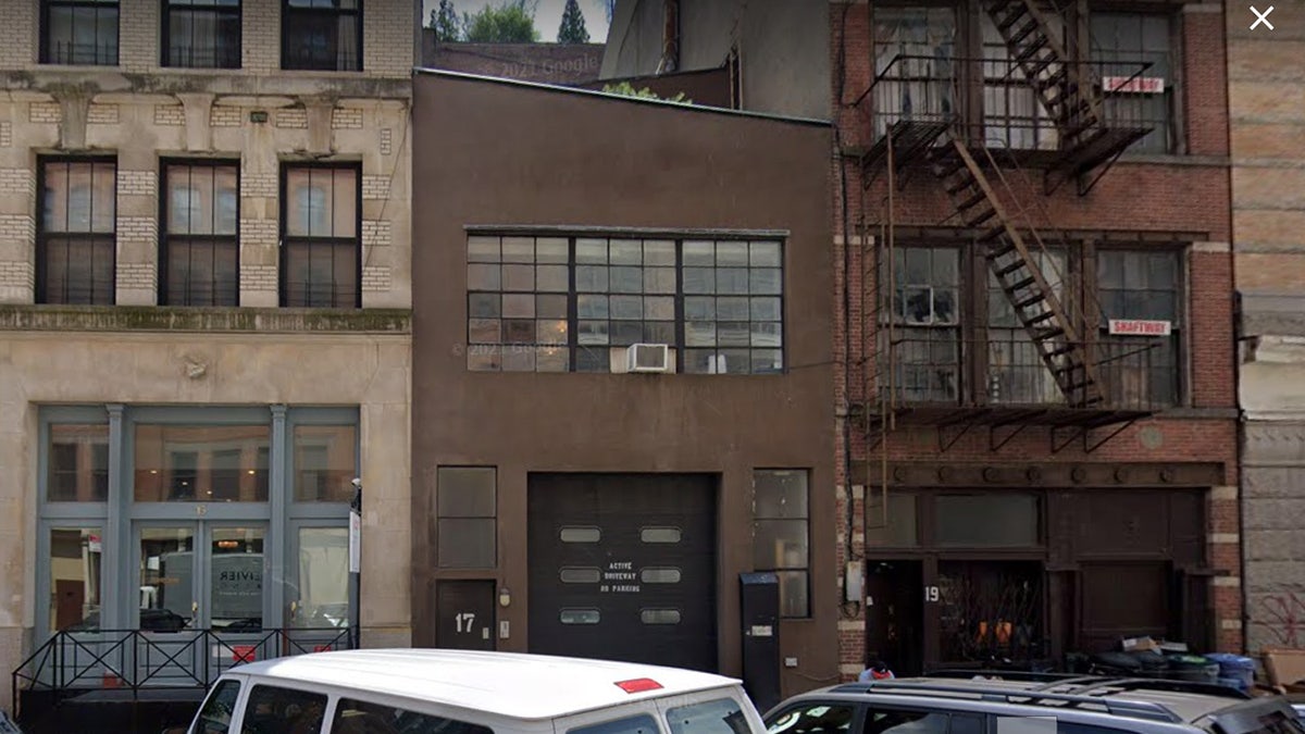 The two-story, brown building where Paula Chin was murdered by her son