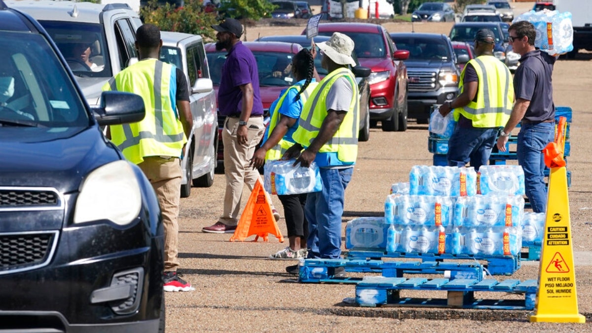 Jackson Walmart workers distribute water