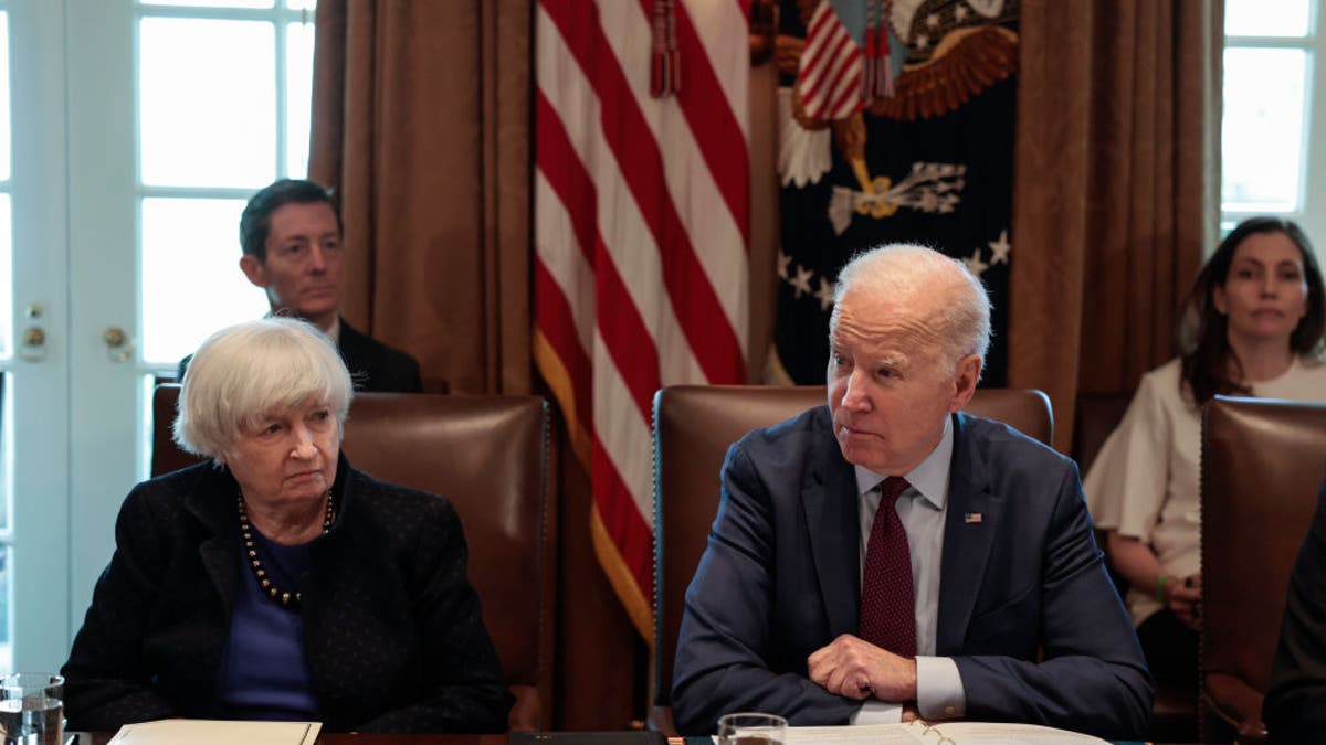 WASHINGTON, DC - MARCH 03: U.S. Secretary of the Treasury Janet Yellen listens as U.S. President Joe Biden speaks to reporters before the start of a cabinet meeting in the Cabinet Room of the White House on March 03, 2022 in Washington, DC. Earlier today, President Biden spoke on a secure video call with fellow Quad Leaders, Prime Minister Scott Morrison of Australia, Prime Minister Narendra Modi of India, and Prime Minister Kishida Fumio of Japan, to discuss the war in Ukraine. (Photo by Anna Moneymaker/Getty Images)